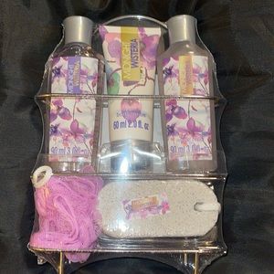 Wisteria shower set in a silver hanging wire rack.